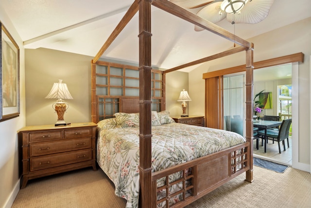 carpeted bedroom with lofted ceiling with beams and ceiling fan