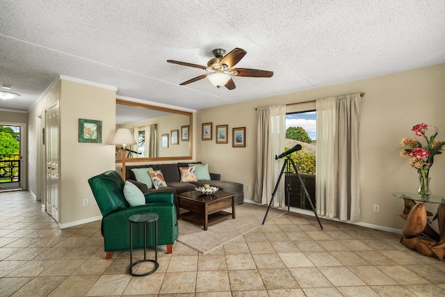 tiled living room with ceiling fan and a textured ceiling