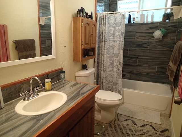 full bathroom with shower / bath combination with curtain, vanity, and toilet