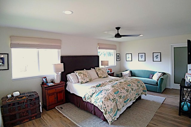 bedroom featuring ceiling fan and hardwood / wood-style flooring