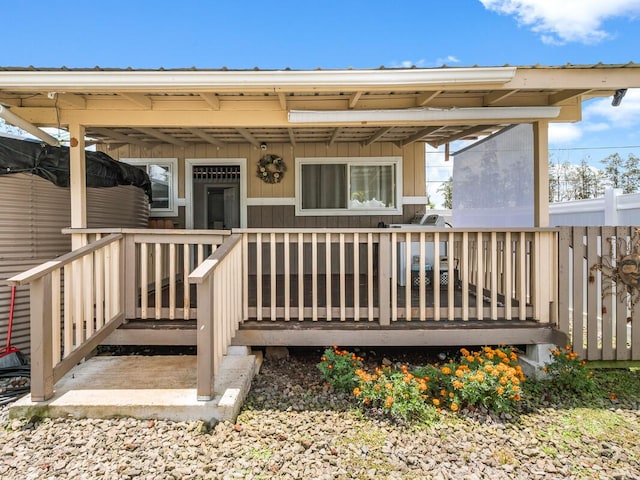 doorway to property featuring a deck