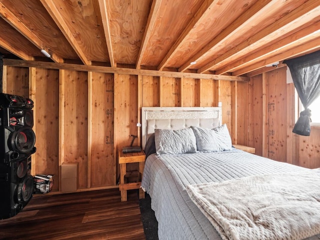 bedroom with dark hardwood / wood-style flooring