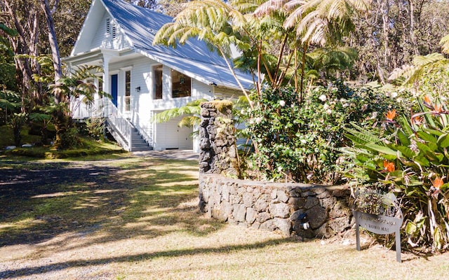 view of side of property with a garage