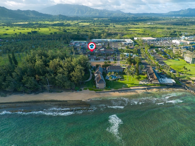 aerial view featuring a water and mountain view