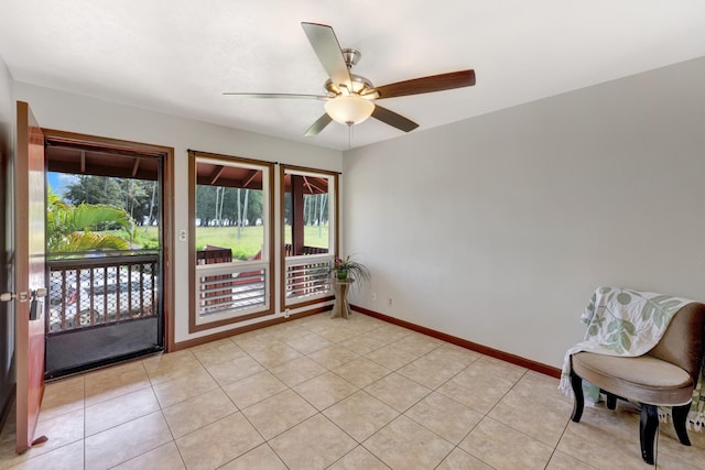 interior space featuring ceiling fan and light tile patterned flooring