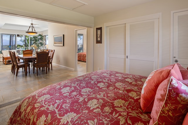 bedroom with multiple closets