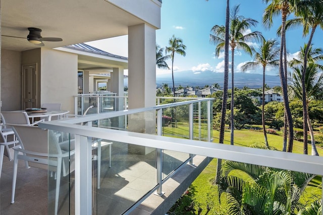 balcony featuring ceiling fan