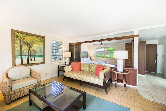 living room with hardwood / wood-style flooring and crown molding