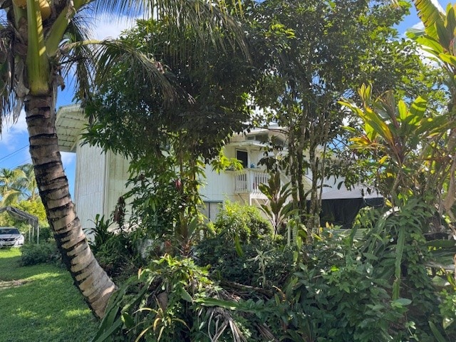 view of property exterior with a balcony