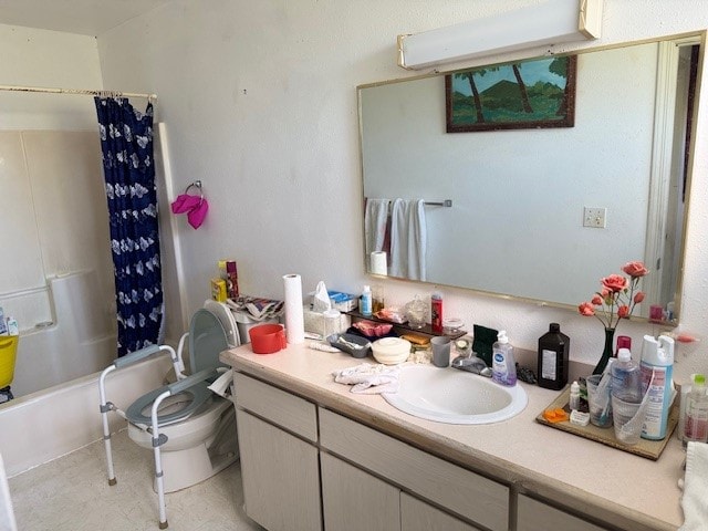 full bathroom with toilet, shower / tub combo, and vanity