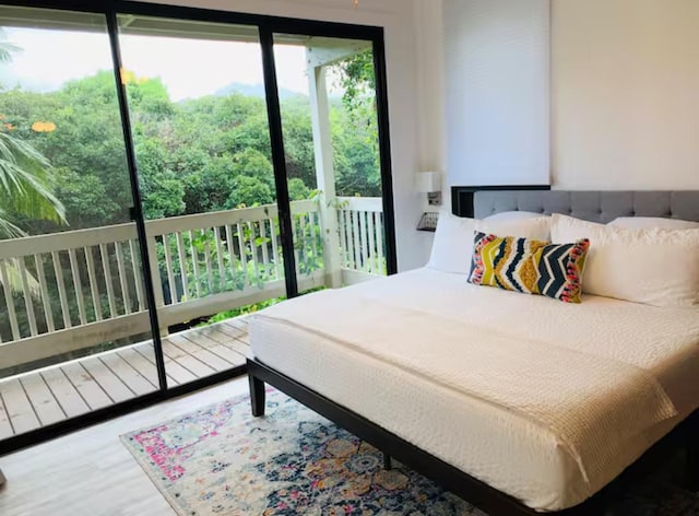 bedroom featuring hardwood / wood-style floors