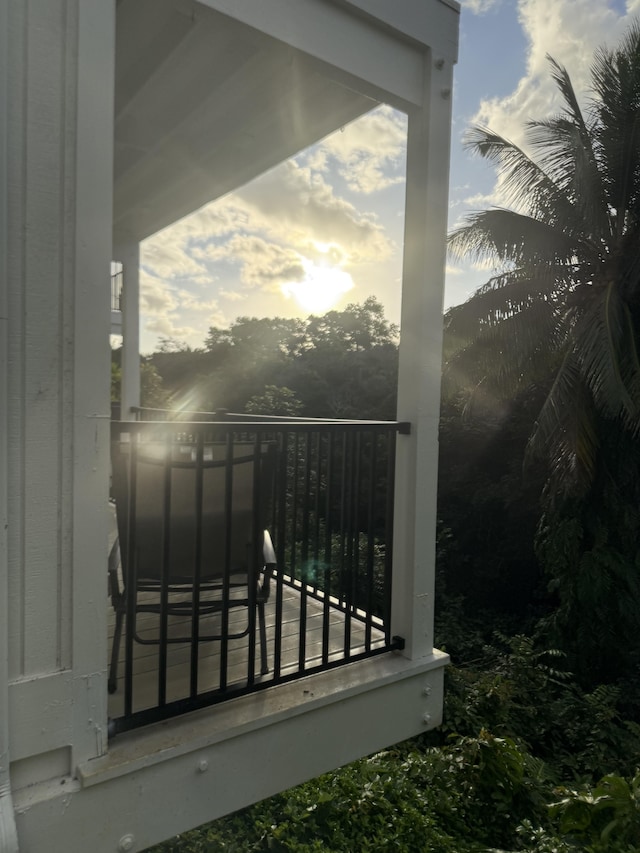 view of balcony at dusk