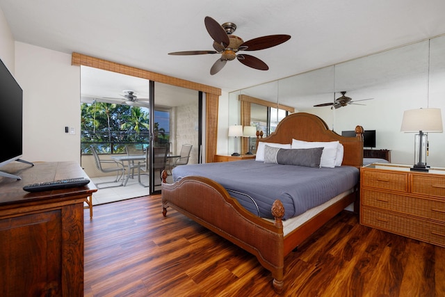 bedroom with ceiling fan, dark hardwood / wood-style floors, and access to outside