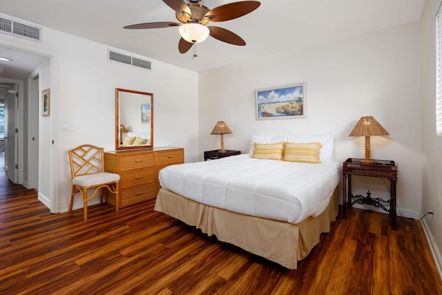 bedroom with dark wood-type flooring and ceiling fan