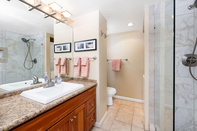 bathroom with vanity, toilet, an enclosed shower, and tile patterned flooring