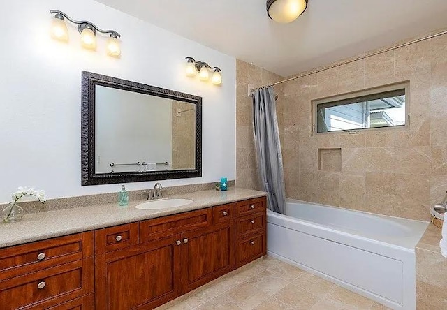 full bath with vanity and shower / tub combo with curtain