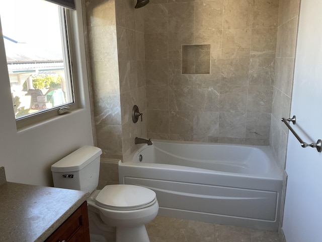 bathroom featuring shower / washtub combination, vanity, and toilet