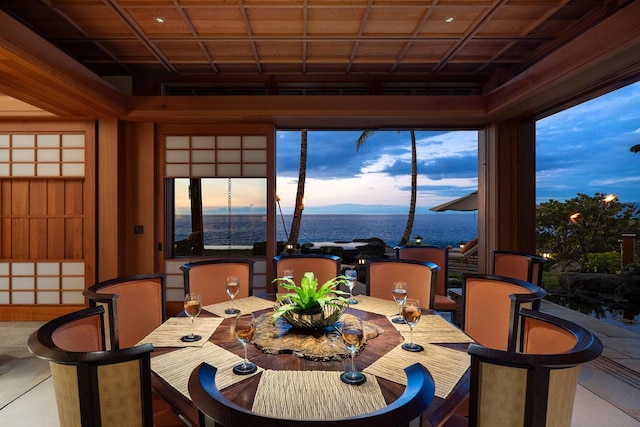 dining room with a water view