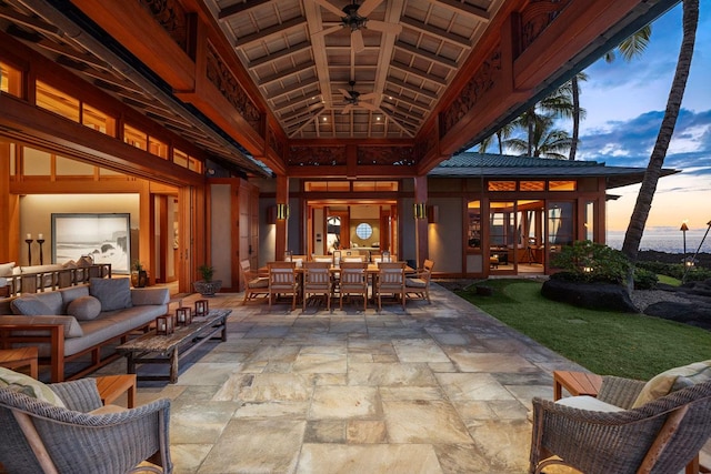 exterior space with outdoor lounge area and ceiling fan