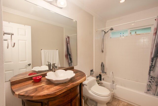 full bathroom featuring crown molding, shower / tub combo, tile patterned flooring, vanity, and toilet