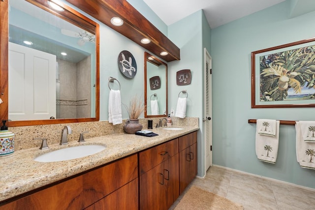 bathroom featuring vanity and tile patterned flooring