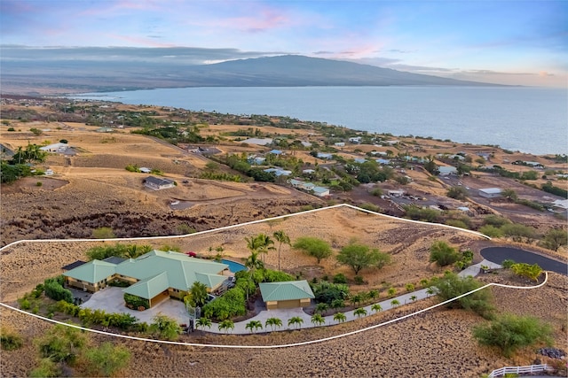 bird's eye view with a water and mountain view