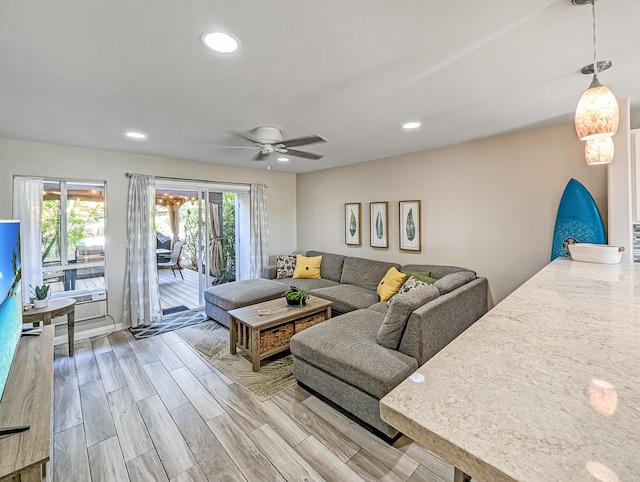 living room featuring ceiling fan