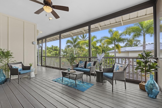 sunroom / solarium with ceiling fan