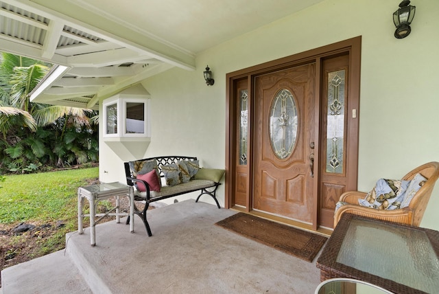 doorway to property featuring covered porch