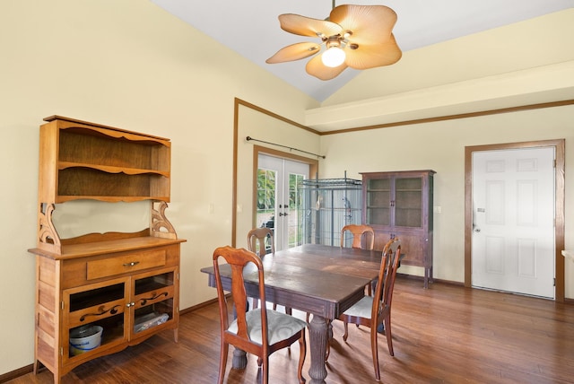 dining space featuring ceiling fan, dark hardwood / wood-style floors, lofted ceiling, and french doors