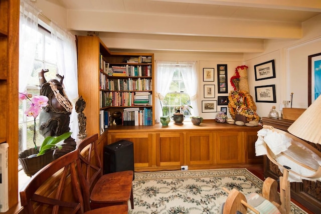 office space with plenty of natural light and beamed ceiling