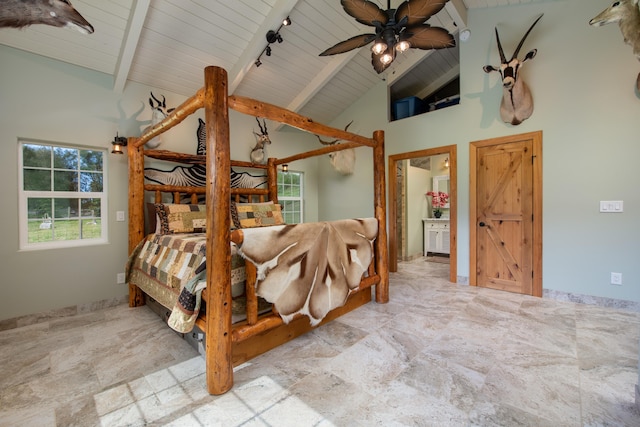 bedroom featuring beamed ceiling, rail lighting, high vaulted ceiling, and wood ceiling