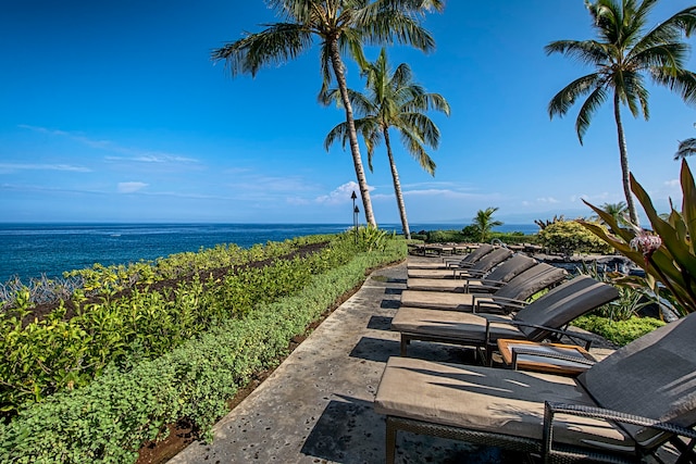 view of patio / terrace with a water view