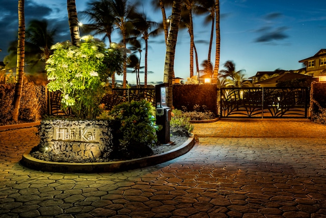 view of gate at dusk