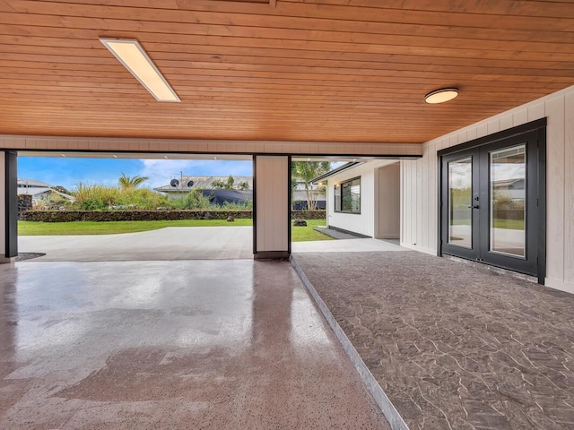 interior space featuring wood ceiling and a wealth of natural light