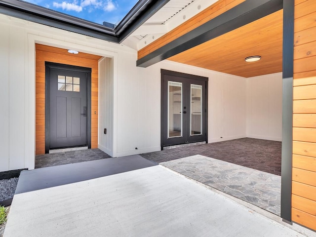 doorway to property with a patio area and french doors