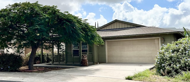 view of front facade with a garage and a porch