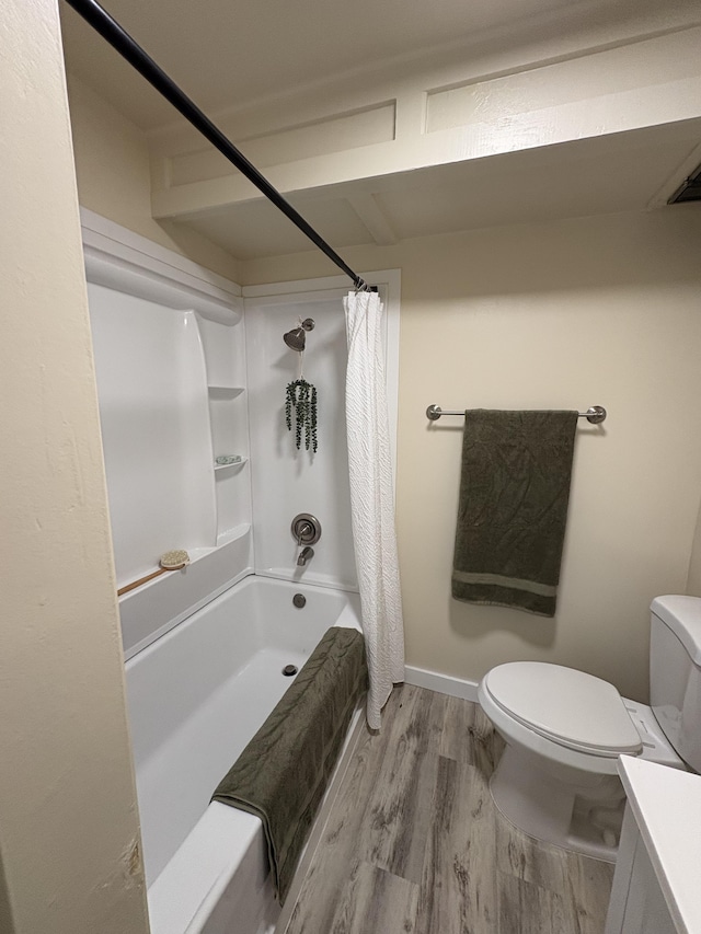 full bathroom with toilet, vanity, shower / bath combo, and hardwood / wood-style flooring