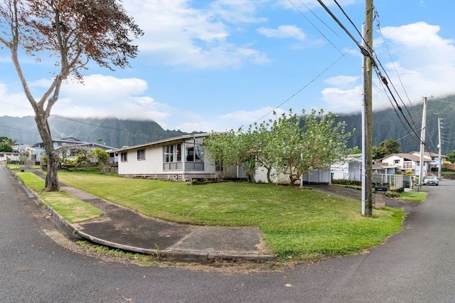 view of front of home with a front lawn