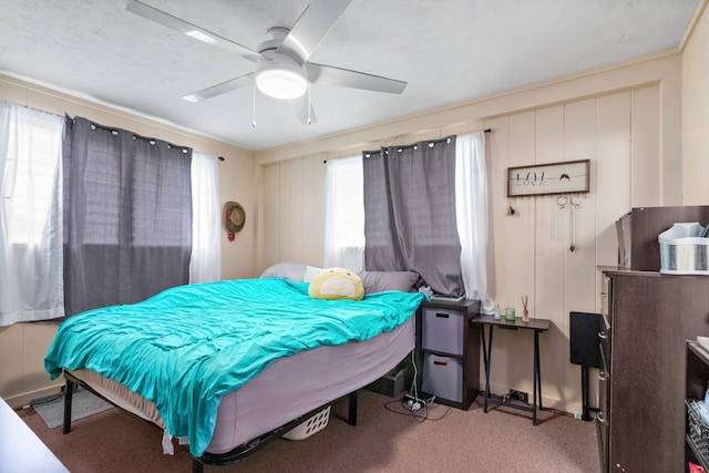 bedroom featuring ceiling fan and carpet flooring