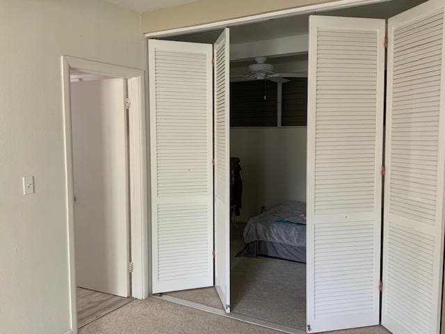 unfurnished bedroom featuring a closet and carpet flooring