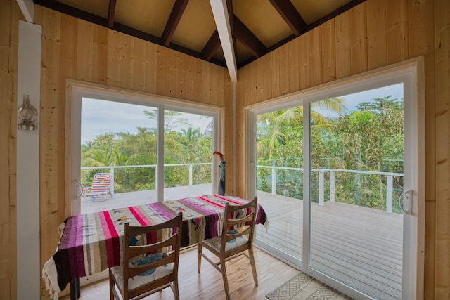 sunroom / solarium with lofted ceiling