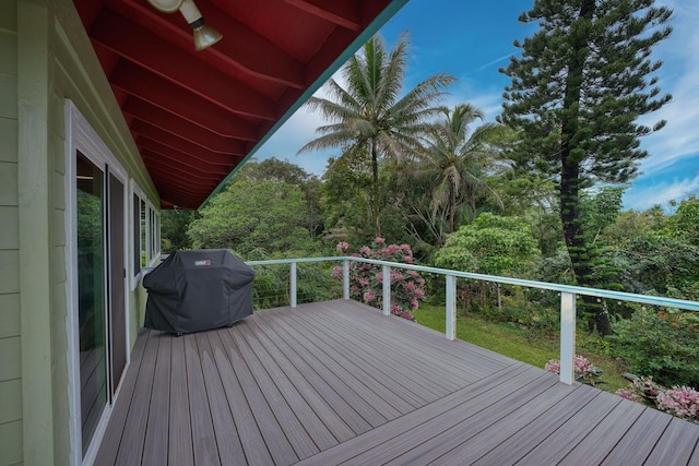 wooden deck featuring area for grilling