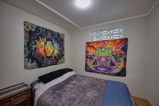 bedroom featuring a textured ceiling