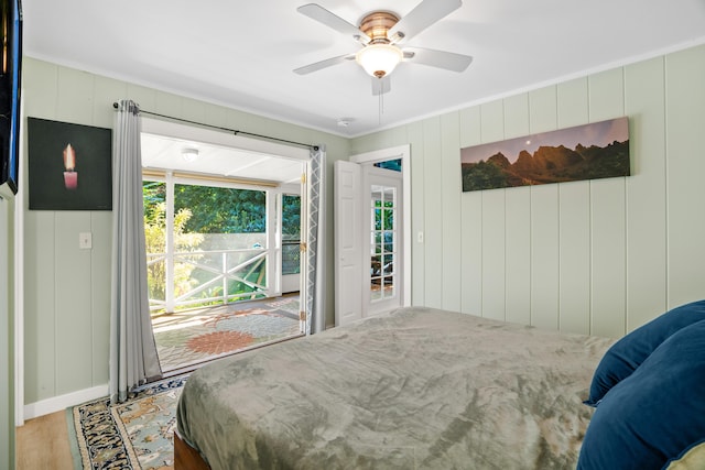 bedroom featuring wood-type flooring, crown molding, access to exterior, and ceiling fan