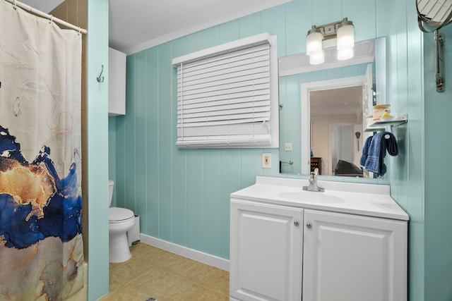 bathroom featuring vanity, toilet, and a shower with shower curtain