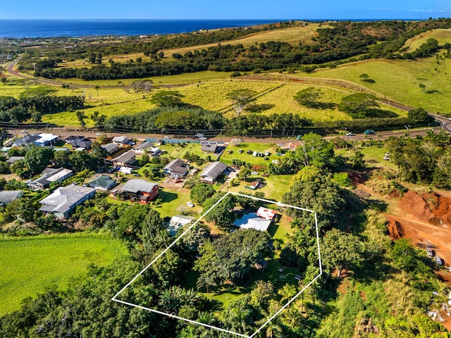 aerial view featuring a water view