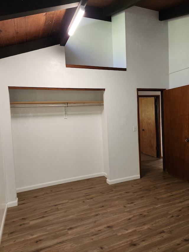 interior space featuring wood ceiling, baseboards, and wood finished floors