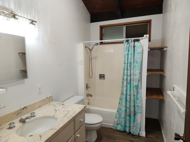 full bathroom with vanity, shower / bath combo with shower curtain, wood finished floors, and toilet