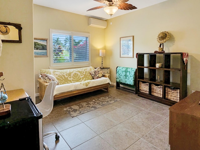 sitting room featuring ceiling fan, tile patterned floors, and a wall mounted AC